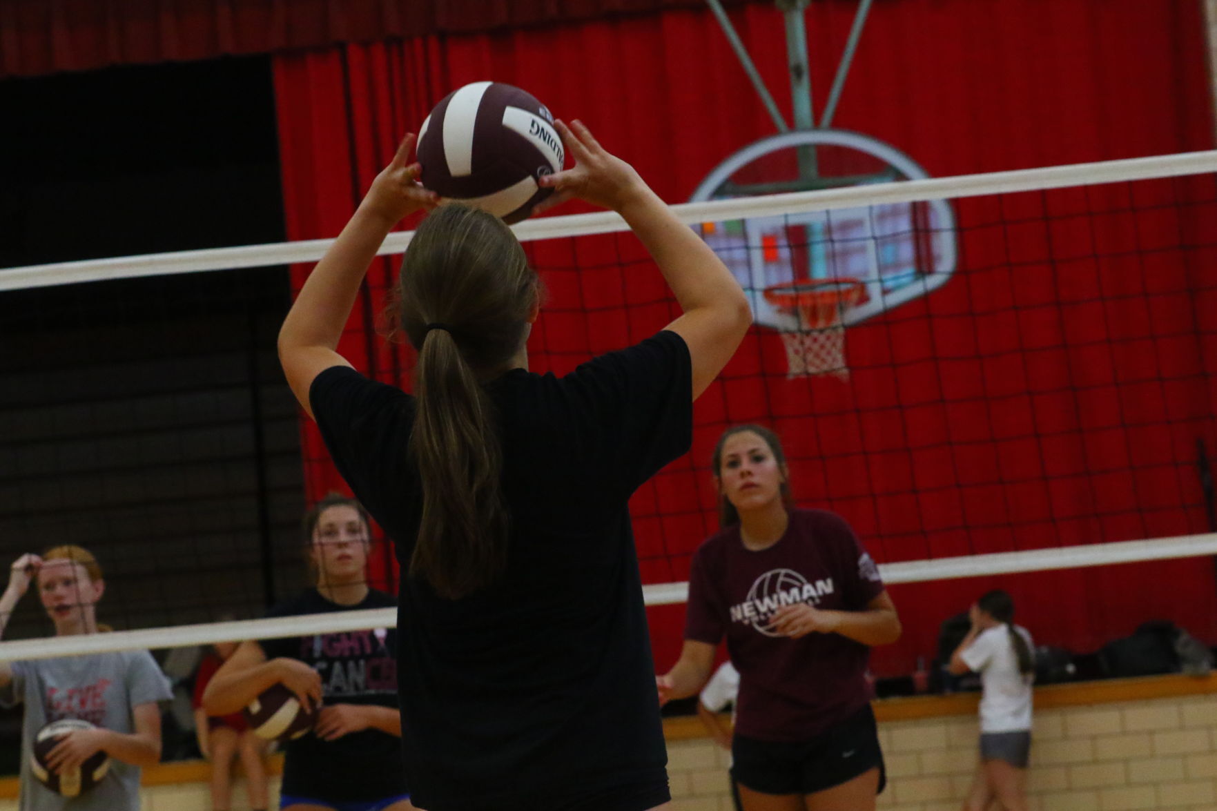 Newman Catholic vb 3